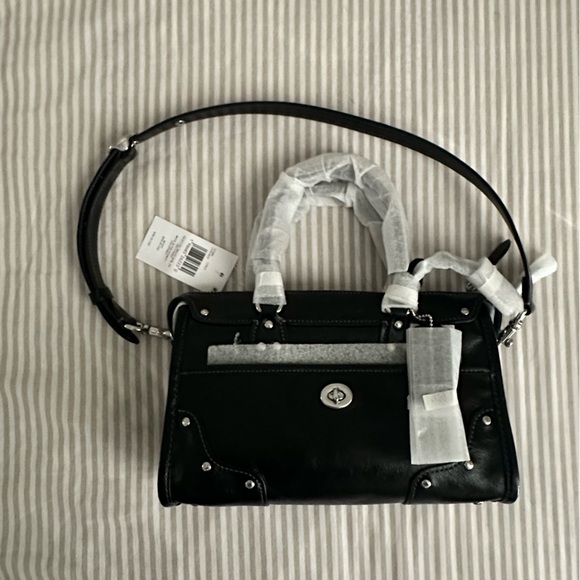 Coach Handbags - Coach Black Rhyder 24